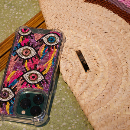 Casa Duniya's Hand-Beaded Embellished Multi-Colored Evil Eye Phone Case with Straw Clutch Bag with Beaded Tassels